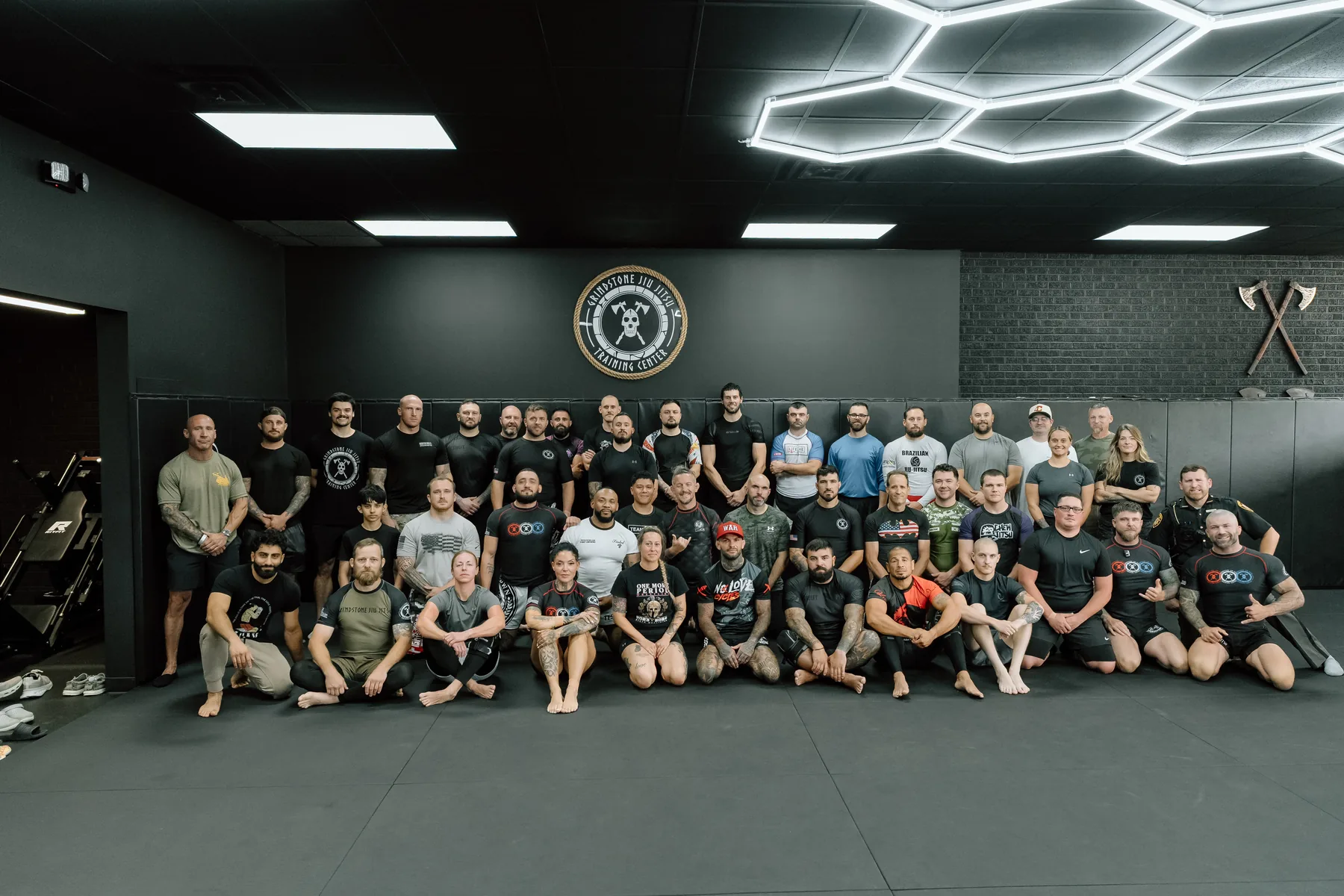 Participants gathered on the Grindstone mats during Armor Within 2025