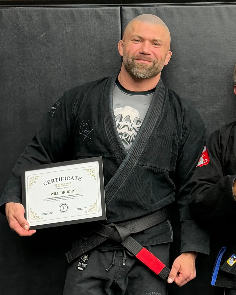 Will Brooks holding a defensive tactics training certificate